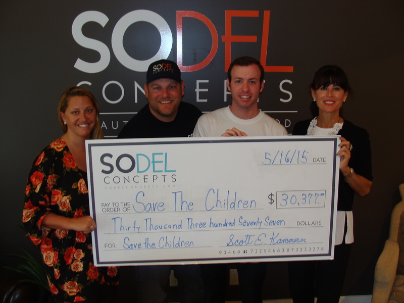 SoDel Concepts organized a fundraiser to benefit Save the Children, which is providing aid to earthquake victims in Nepal. A number of coastal restaurants and foundations donated that day. Shown are (l-r) Shannon Colburn, representative of the Matt James Haley Trust; Scott Kammerer, president and CEO of SoDel Concepts; Phil Carroll, director of media and communications for Save the Children USA; and Michelle Freeman, president and CEO of the Carl M. Freeman Companies and chair of the Carl M. Freeman Foundation, which along with the Matthew James Haley Trust donated funds. SOURCE SUBMITTED